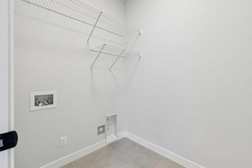 9 Treeline Avenue Sw, Calgary, AB - Indoor With Storage