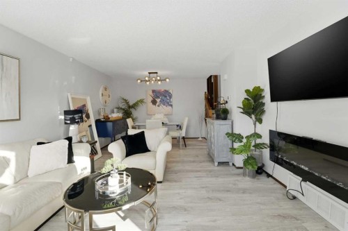 101 Erickson Drive, Red Deer, AB - Indoor Photo Showing Living Room With Fireplace