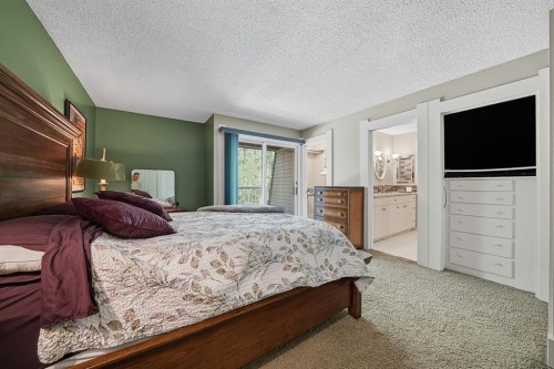 120 Birchcliff Road, Birchcliff, AB - Indoor Photo Showing Bedroom