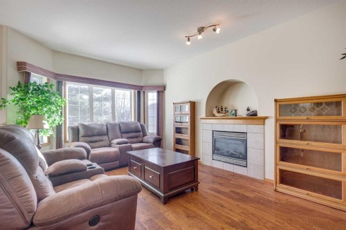 38 Kendrew Drive, Red Deer, AB - Indoor Photo Showing Living Room With Fireplace