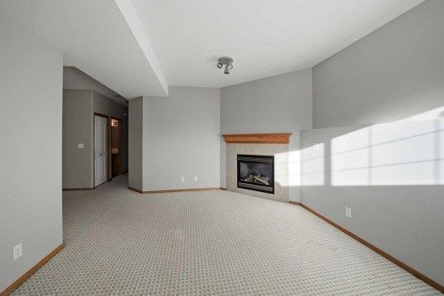 96 Addington Drive, Red Deer, AB - Indoor With Fireplace