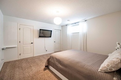 93 Dowler Street, Red Deer, AB - Indoor Photo Showing Bedroom