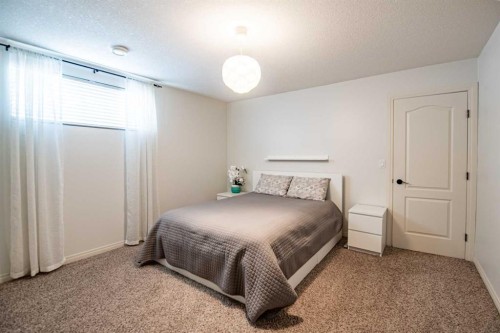 93 Dowler Street, Red Deer, AB - Indoor Photo Showing Bedroom