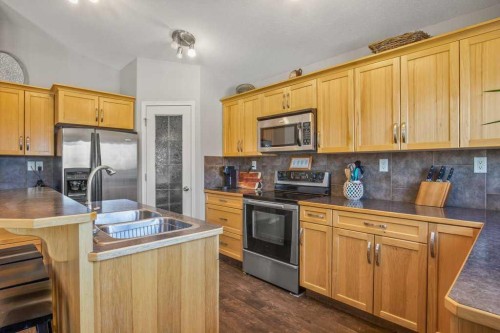 15 Issard Close, Red Deer, AB - Indoor Photo Showing Kitchen With Stainless Steel Kitchen With Double Sink
