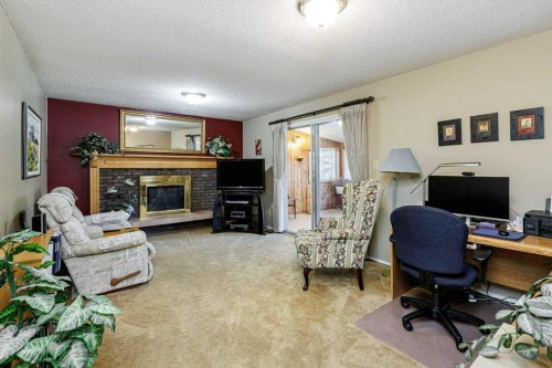 15 Waghorn Close, Red Deer, AB - Indoor With Fireplace