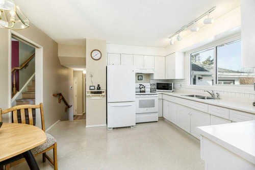 15 Waghorn Close, Red Deer, AB - Indoor Photo Showing Kitchen With Double Sink