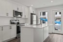 14675 1 Street Ne, Calgary, AB  - Indoor Photo Showing Kitchen With Upgraded Kitchen 