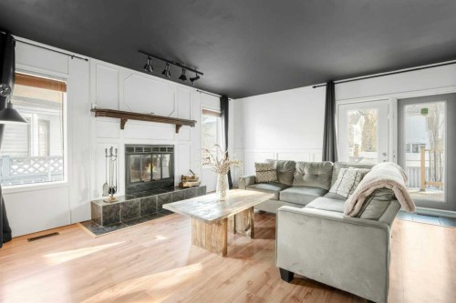 50 Denovan Crescent, Red Deer, AB - Indoor Photo Showing Living Room With Fireplace