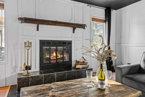 50 Denovan Crescent, Red Deer, AB - Indoor Photo Showing Living Room With Fireplace
