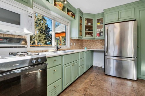 3742 44 Avenue, Red Deer, AB - Indoor Photo Showing Kitchen With Double Sink