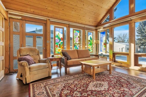 3742 44 Avenue, Red Deer, AB - Indoor Photo Showing Living Room With Fireplace