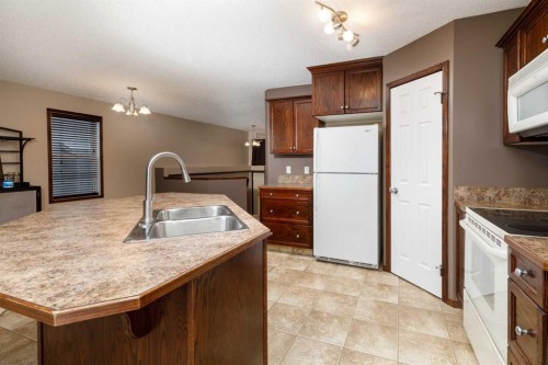 36 Johns Street, Red Deer, AB - Indoor Photo Showing Kitchen With Double Sink