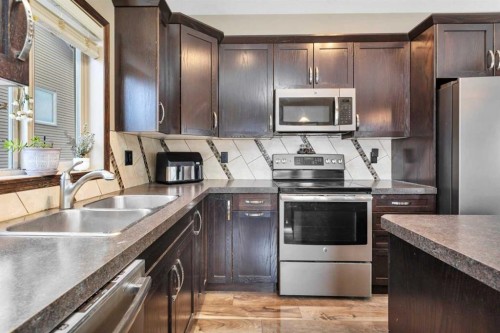 94 Stephenson Crescent, Red Deer, AB - Indoor Photo Showing Kitchen With Stainless Steel Kitchen With Double Sink