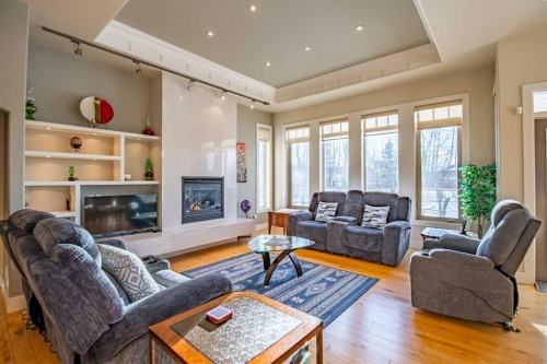 92 Fieldstone Way, Sylvan Lake, AB - Indoor Photo Showing Living Room With Fireplace