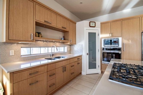 92 Fieldstone Way, Sylvan Lake, AB - Indoor Photo Showing Kitchen With Double Sink