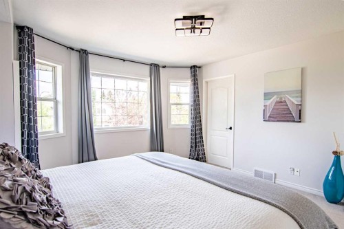 5008 41 Street, Sylvan Lake, AB - Indoor Photo Showing Bedroom