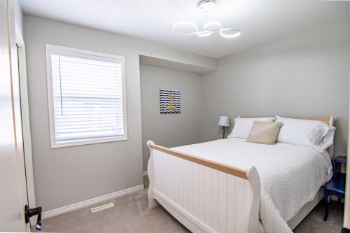5008 41 Street, Sylvan Lake, AB - Indoor Photo Showing Bedroom