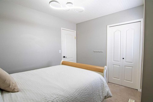 5008 41 Street, Sylvan Lake, AB - Indoor Photo Showing Bedroom