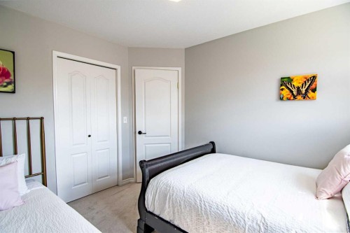 5008 41 Street, Sylvan Lake, AB - Indoor Photo Showing Bedroom