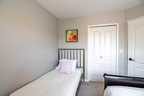 5008 41 Street, Sylvan Lake, AB - Indoor Photo Showing Bedroom