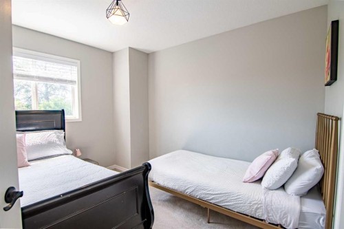 5008 41 Street, Sylvan Lake, AB - Indoor Photo Showing Bedroom