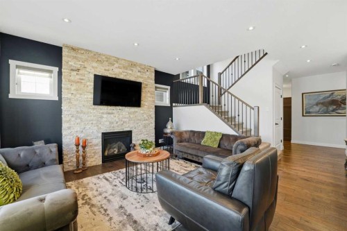 19 Vernon Close, Red Deer, AB - Indoor Photo Showing Living Room With Fireplace
