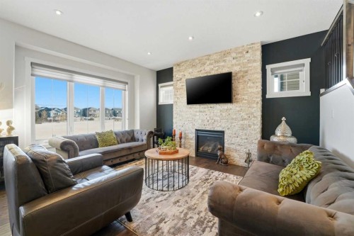 19 Vernon Close, Red Deer, AB - Indoor Photo Showing Living Room With Fireplace