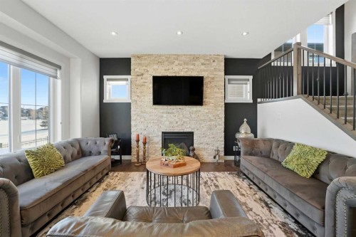 19 Vernon Close, Red Deer, AB - Indoor Photo Showing Living Room With Fireplace