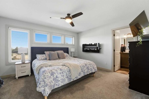 9 Sheep Close, Lacombe, AB - Indoor Photo Showing Bedroom