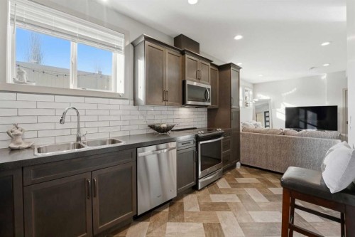 9 Sheep Close, Lacombe, AB - Indoor Photo Showing Kitchen With Double Sink With Upgraded Kitchen