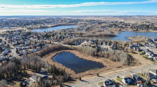 14 Riviera Drive, Lacombe, AB - Outdoor With Body Of Water With View