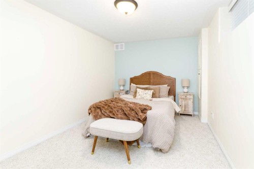 13 Dillon Close, Red Deer, AB - Indoor Photo Showing Bedroom