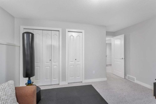 149 Carrington Drive, Red Deer, AB - Indoor Photo Showing Bedroom