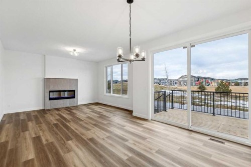 199 Sora Terrace Se, Calgary, AB - Indoor Photo Showing Living Room With Fireplace
