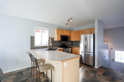 51 Ives Crescent, Red Deer, AB - Indoor Photo Showing Kitchen With Double Sink