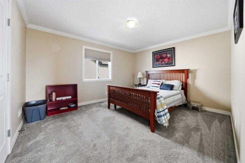 247 Kingston Way Se, Airdrie, AB - Indoor Photo Showing Bedroom