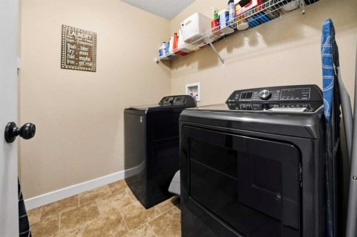 247 Kingston Way Se, Airdrie, AB - Indoor Photo Showing Laundry Room