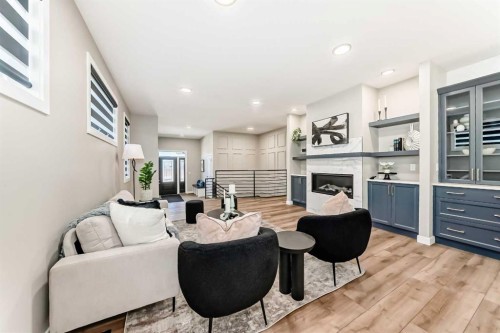 58 Mitchell Crescent, Blackfalds, AB - Indoor Photo Showing Living Room With Fireplace