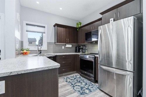 10 Adamson Avenue, Red Deer, AB - Indoor Photo Showing Kitchen With Upgraded Kitchen