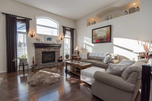 15 Volk Place, Red Deer, AB - Indoor Photo Showing Living Room With Fireplace