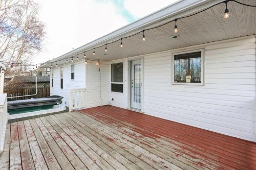 27 Falcon Crescent, Sylvan Lake, AB - Outdoor With Deck Patio Veranda With Exterior