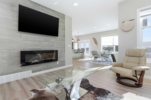 130 Mitchell Crescent, Blackfalds, AB - Indoor Photo Showing Living Room With Fireplace