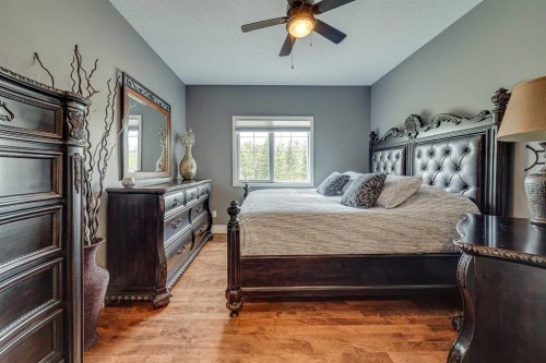 4300 Memorial Trail, Sylvan Lake, AB - Indoor Photo Showing Bedroom