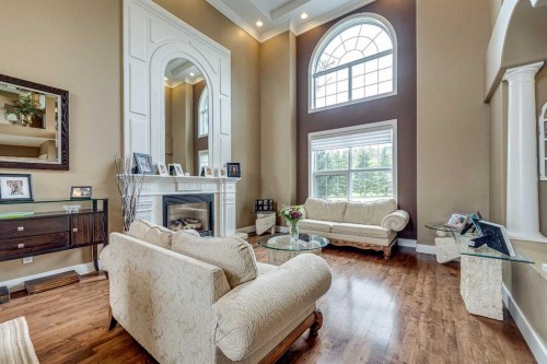 4300 Memorial Trail, Sylvan Lake, AB - Indoor Photo Showing Living Room With Fireplace