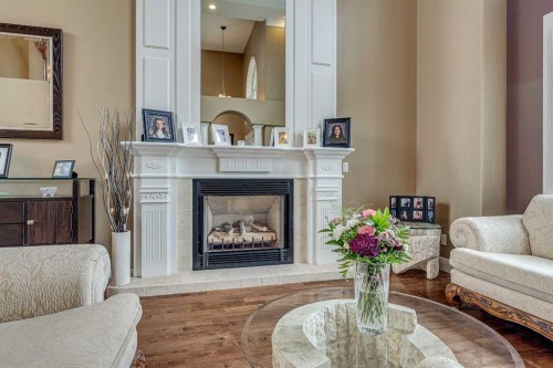 4300 Memorial Trail, Sylvan Lake, AB - Indoor Photo Showing Living Room With Fireplace