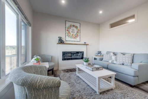 36 Thorkman Avenue, Red Deer, AB - Indoor Photo Showing Living Room With Fireplace