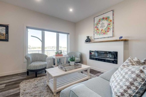 36 Thorkman Avenue, Red Deer, AB - Indoor Photo Showing Living Room With Fireplace