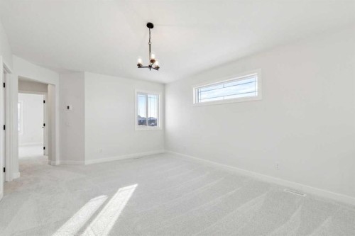 571 Buffaloberry Manor Se, Calgary, AB - Indoor Photo Showing Other Room