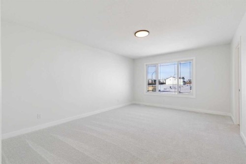 571 Buffaloberry Manor Se, Calgary, AB - Indoor Photo Showing Other Room
