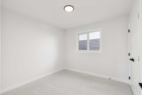 571 Buffaloberry Manor Se, Calgary, AB - Indoor Photo Showing Other Room